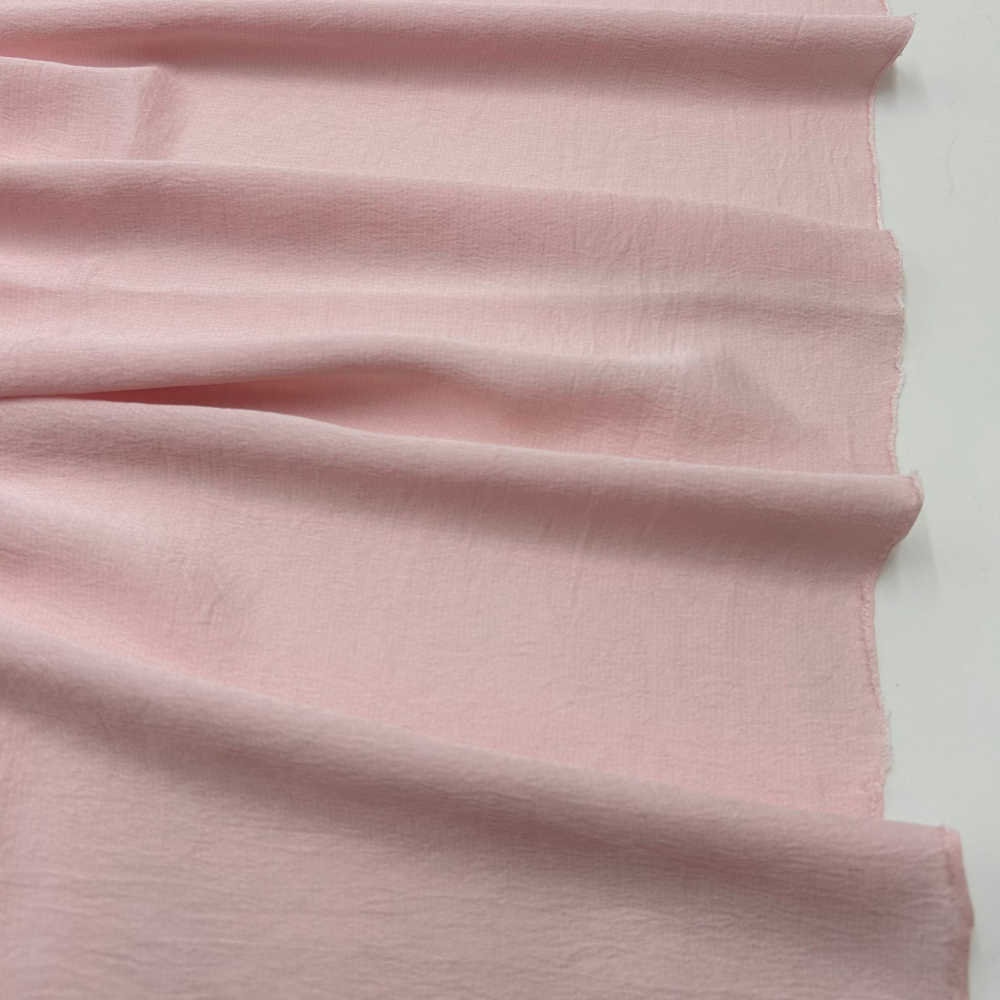 tissu crêpe satiné rose